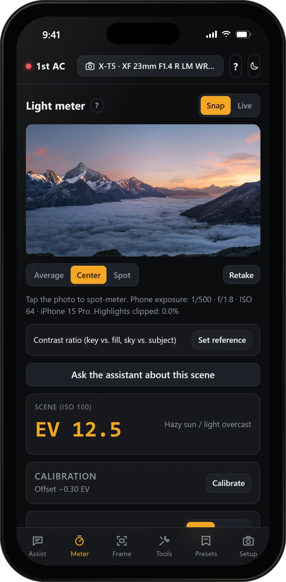 1st AC's light meter showing a snapped mountain scene above the clouds, center metering and a reading of EV 12.5.